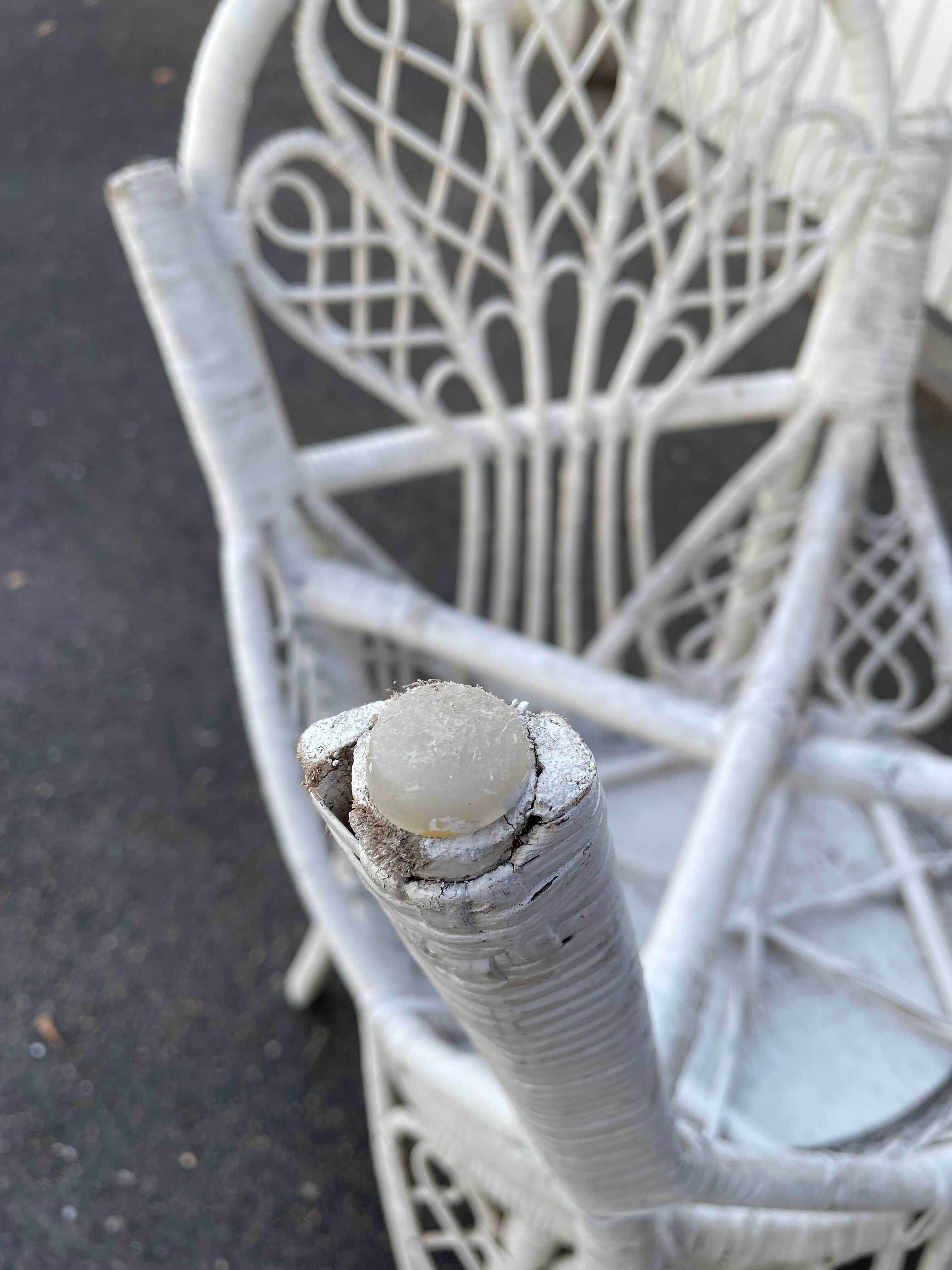 Pair of white peacock rattan chairs, circa 1960