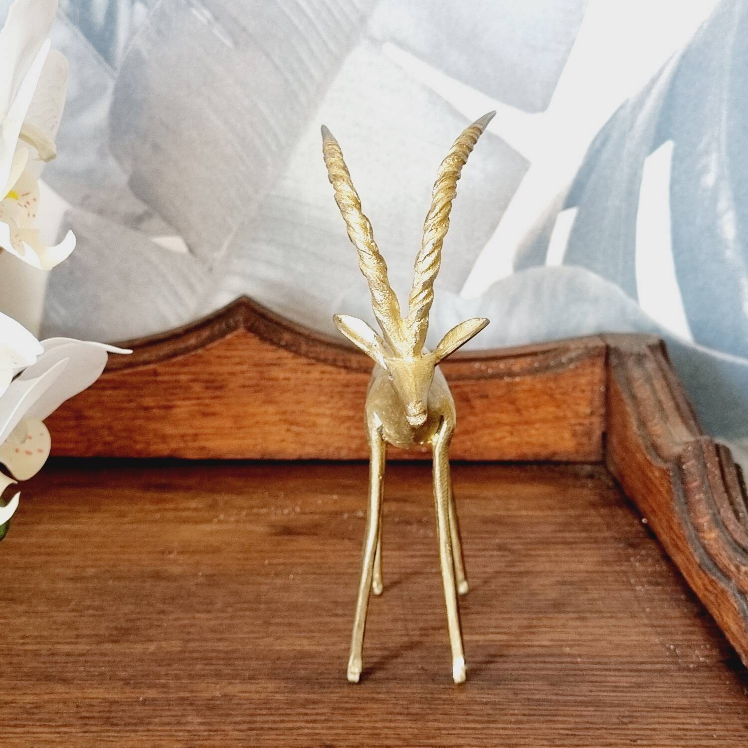 Chiseled brass antelope
