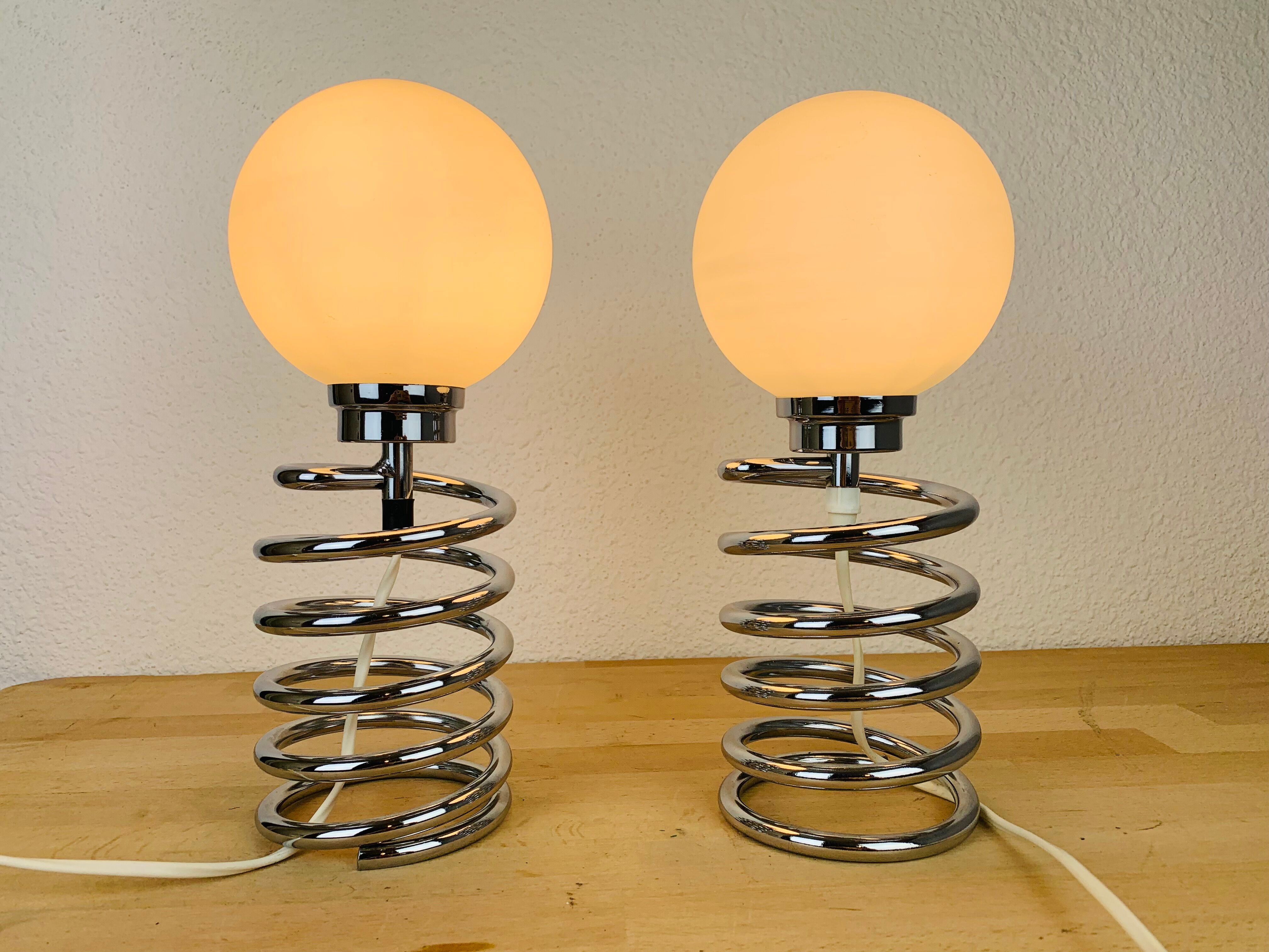 Pair of lamps spring chrome 70s