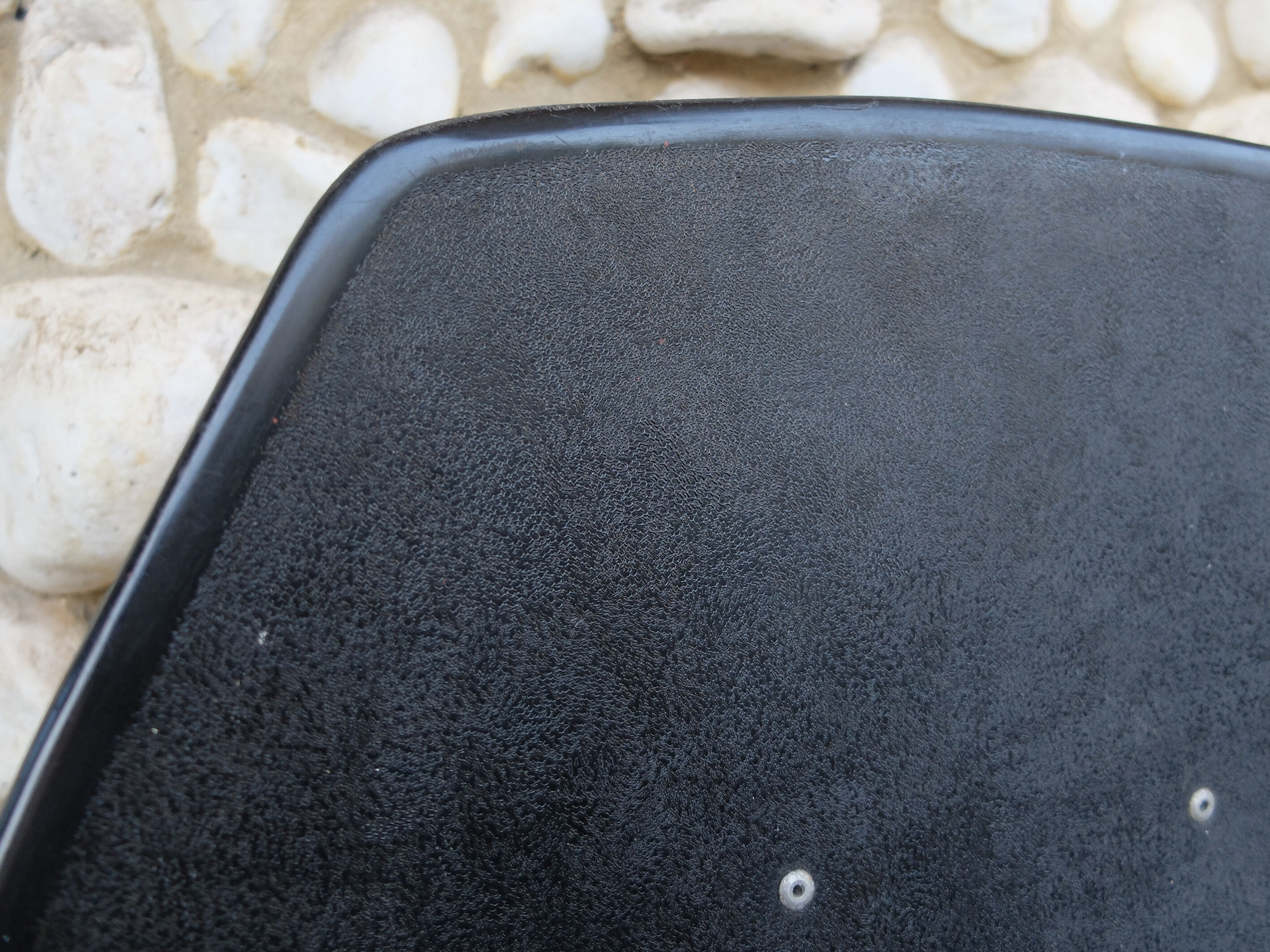 Black shell chair Pierre Guariche for Meurop 1960s