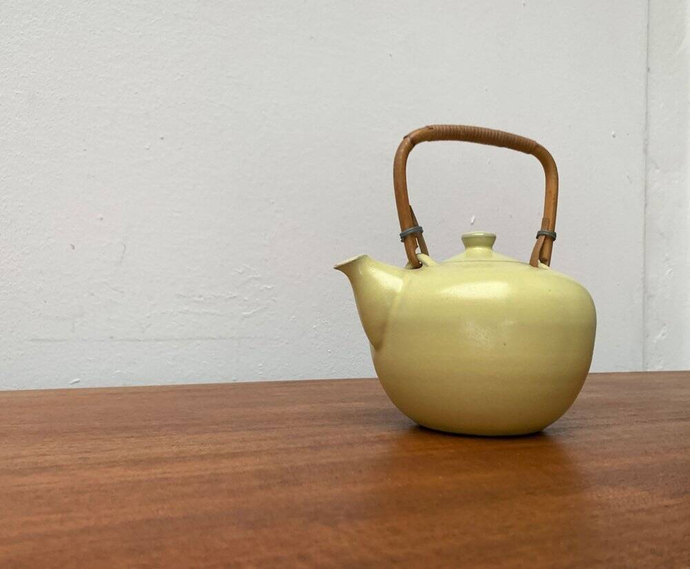 Mid-century ceramic teapot with bamboo handle, 1960s.