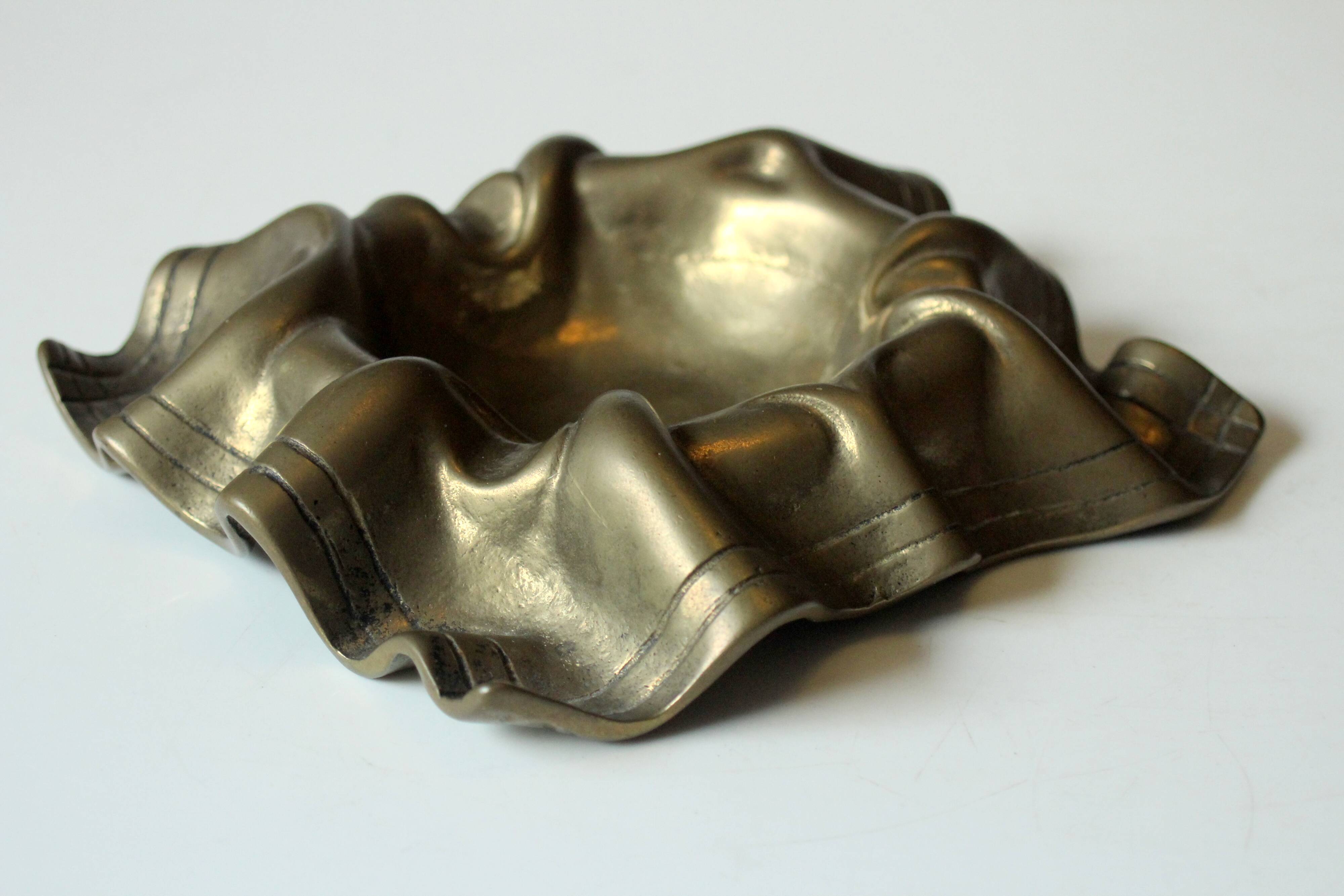 Solid brass ashtray, vintage from the 1950s