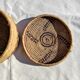 Antique basket with ethnic lid with black/brown and red décor
