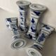 Set of 4 ceramic candle holders in white blue floral pattern