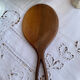 Hand-facing wooden mirror