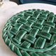 Woven green ceramic trivet in Vallauris style