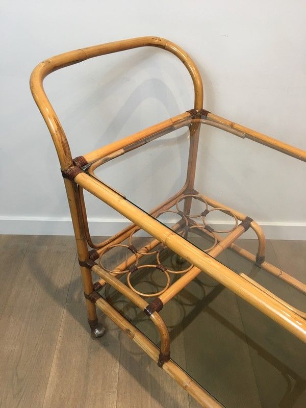 Rattan rolling table and leather ties
