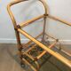 Rattan rolling table and leather ties