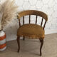 Vintage fringed gondola armchair