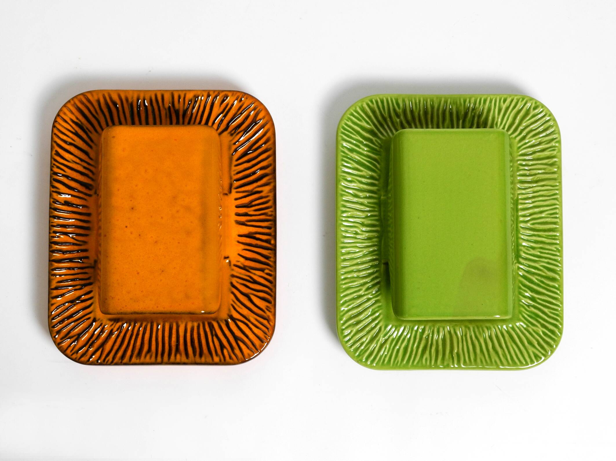 Pair of orange and green glazed 60s ceramic wall lights by Kaiser Leuchten