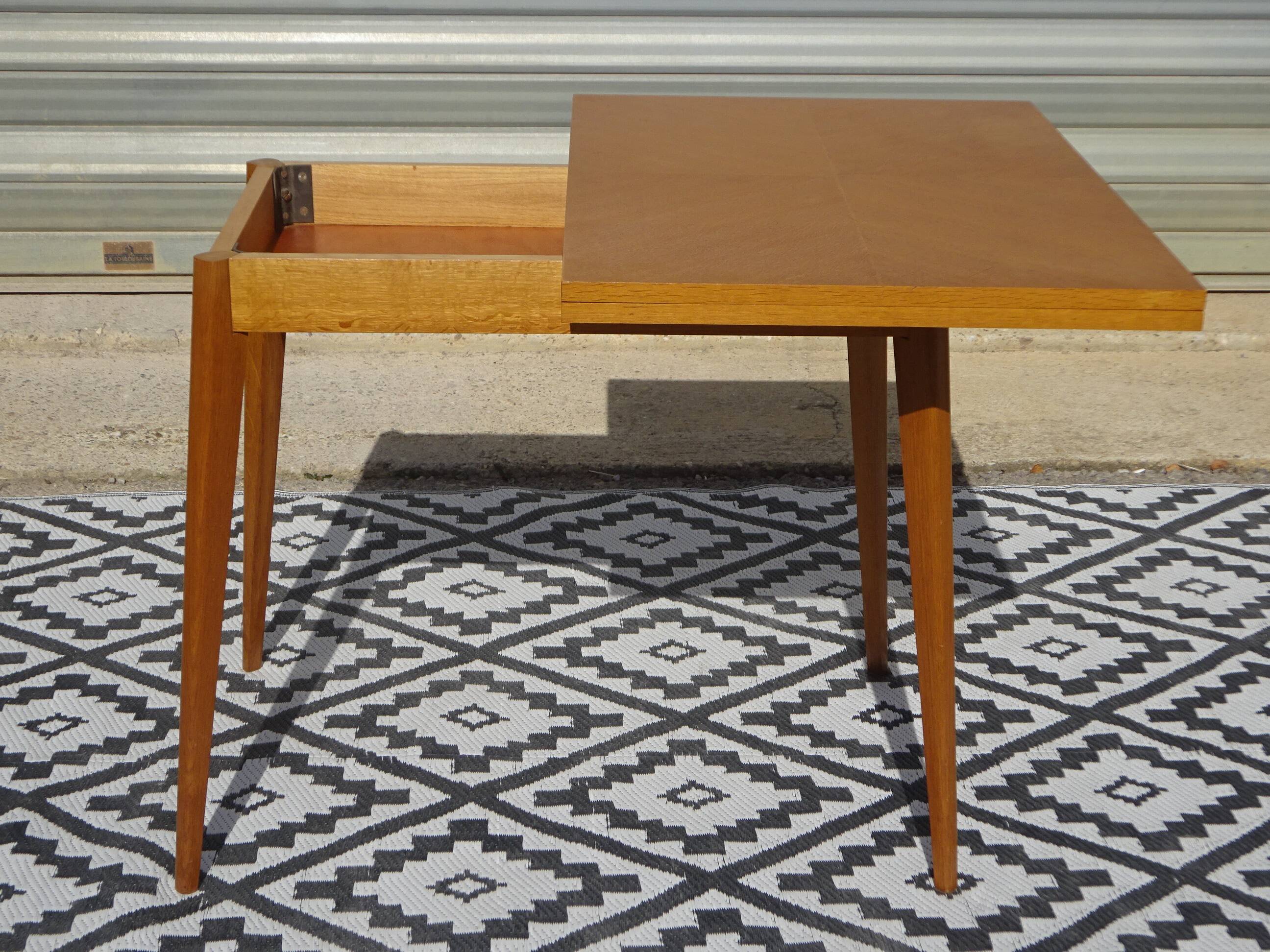 Scandinavian portfolio table model "half-century" by SAM