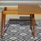 Scandinavian portfolio table model "half-century" by SAM