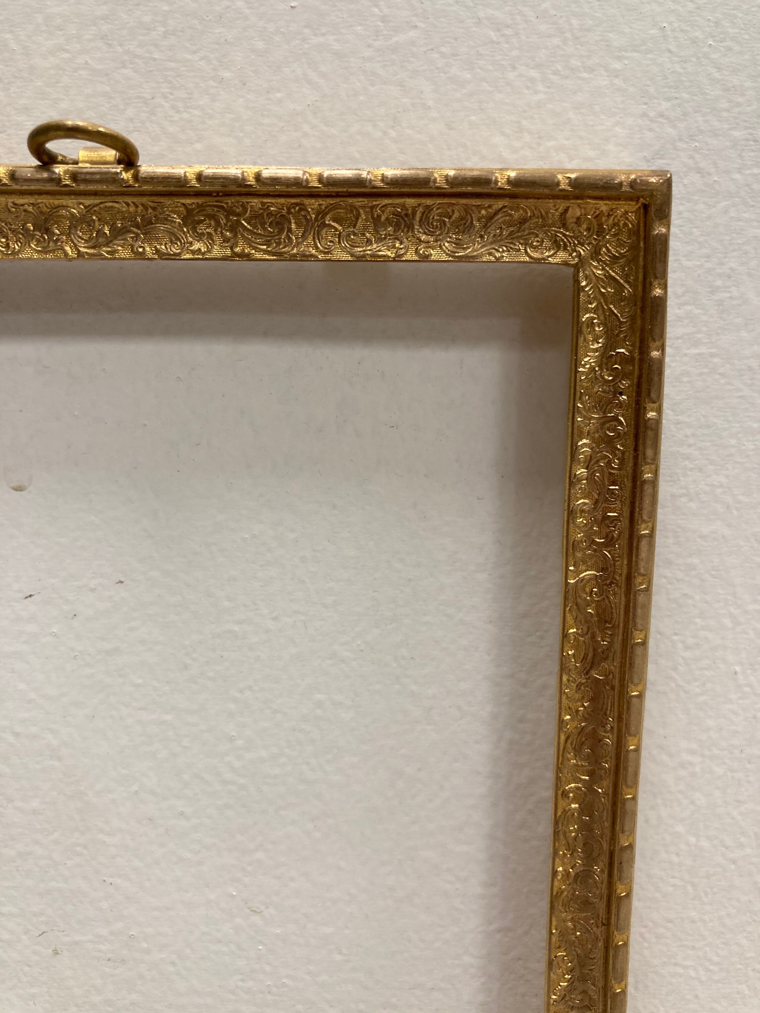 Pair of gold brass frames