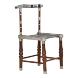 Chair decorated with hammered metal, 20th century