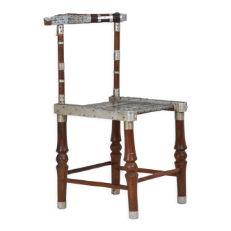 Chair decorated with hammered metal, 20th century