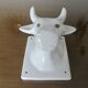 Stylized cow head in white ceramic, wall decoration from the 80s