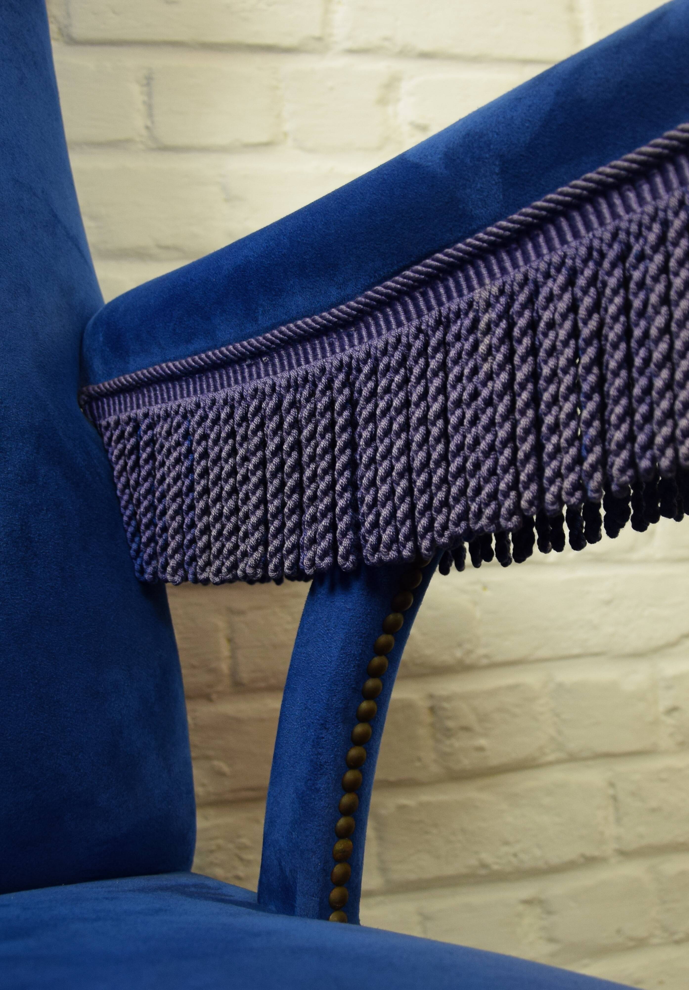 Blue velvet armchair