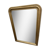 Antique gilded mirror in old Louis Philippe wood