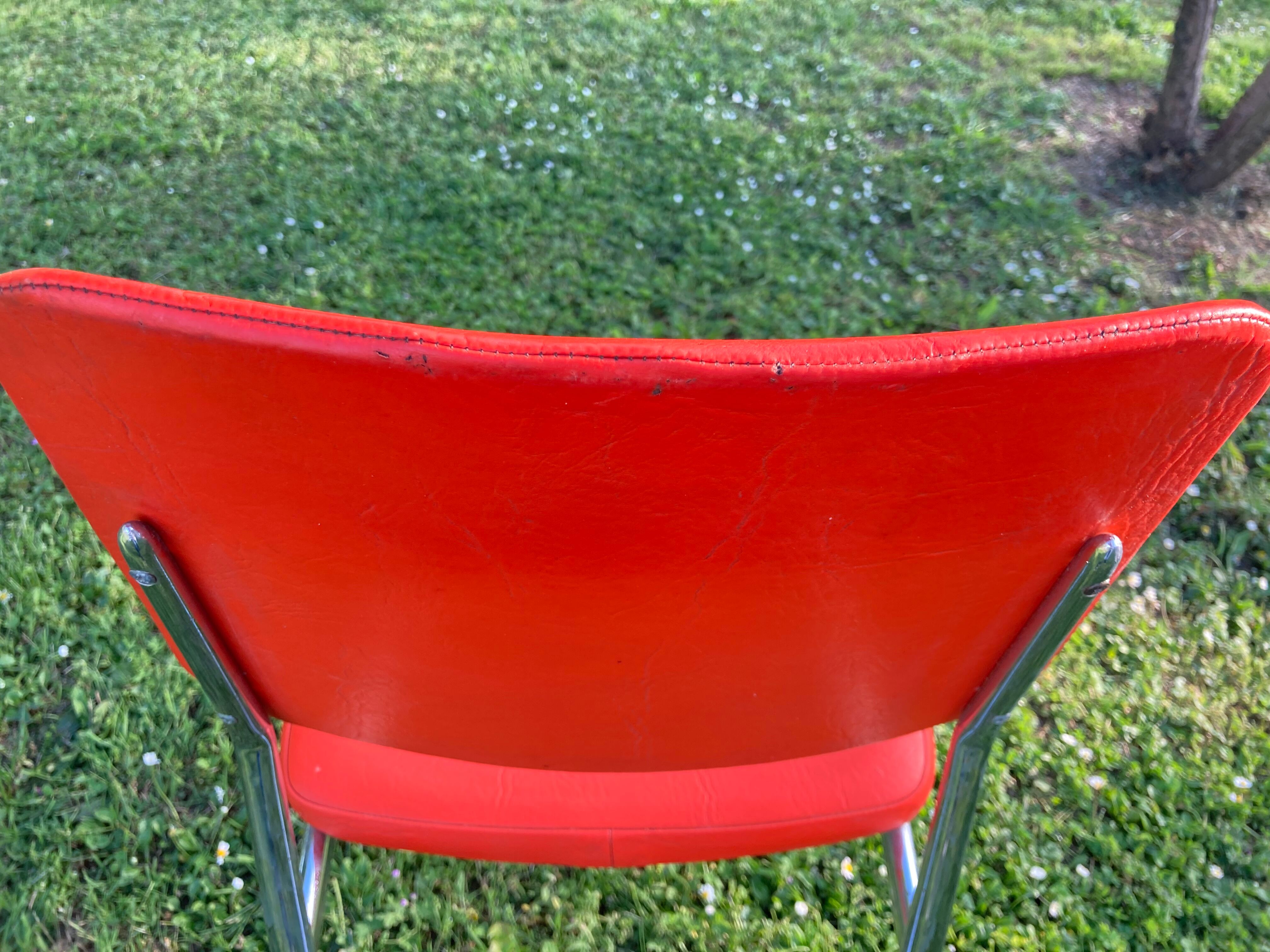Series of 4 vintage orange chairs
