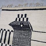 Handmade pure wool rug in black and white, size 150 x 250 cm.