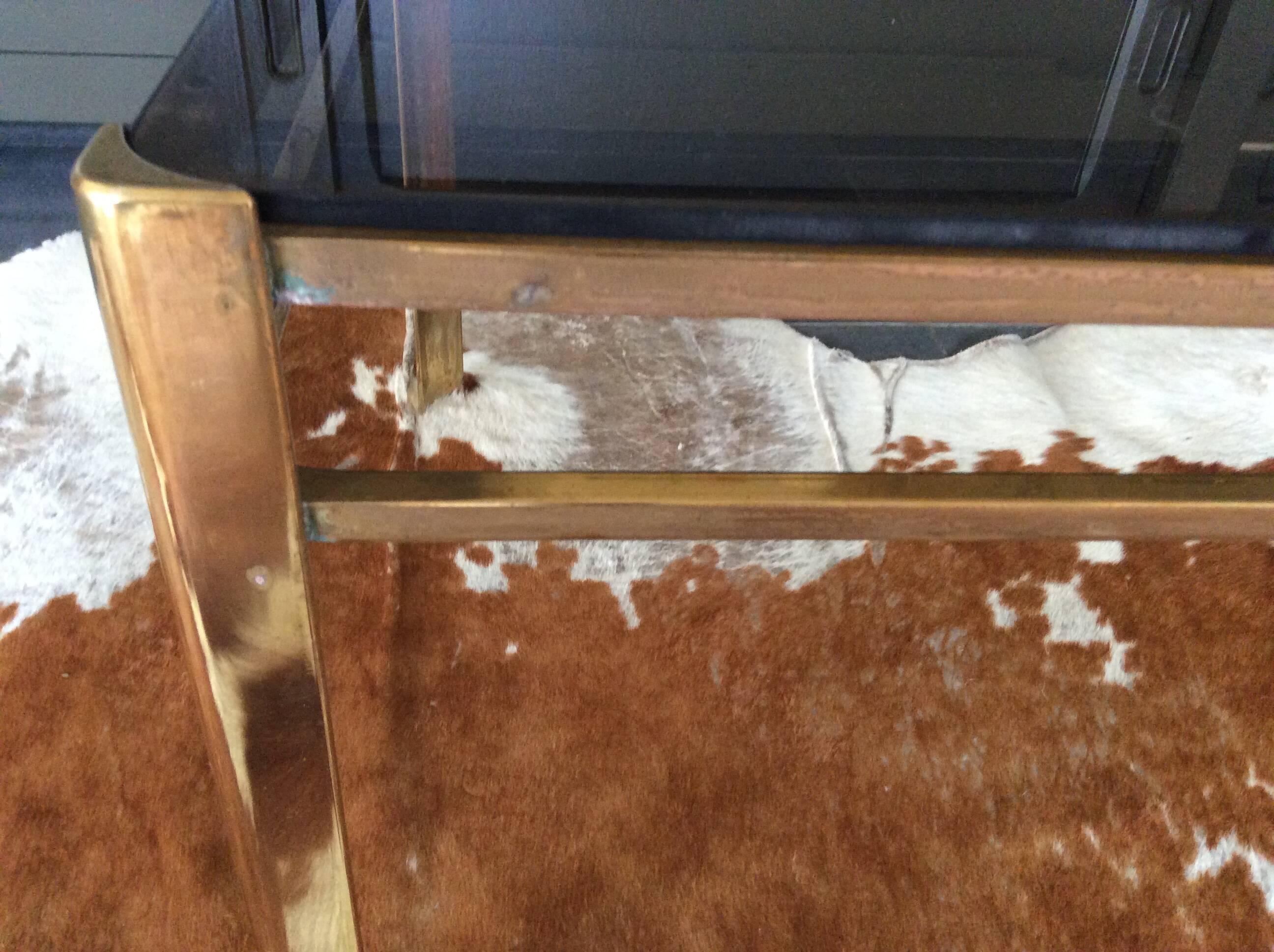Glass and brass coffee table