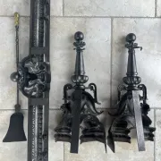 19th-century cast iron fireplace set, bar, andirons & plaque with griffins