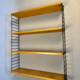 Floating wall shelf in oak veneer and black metal, 1960s.