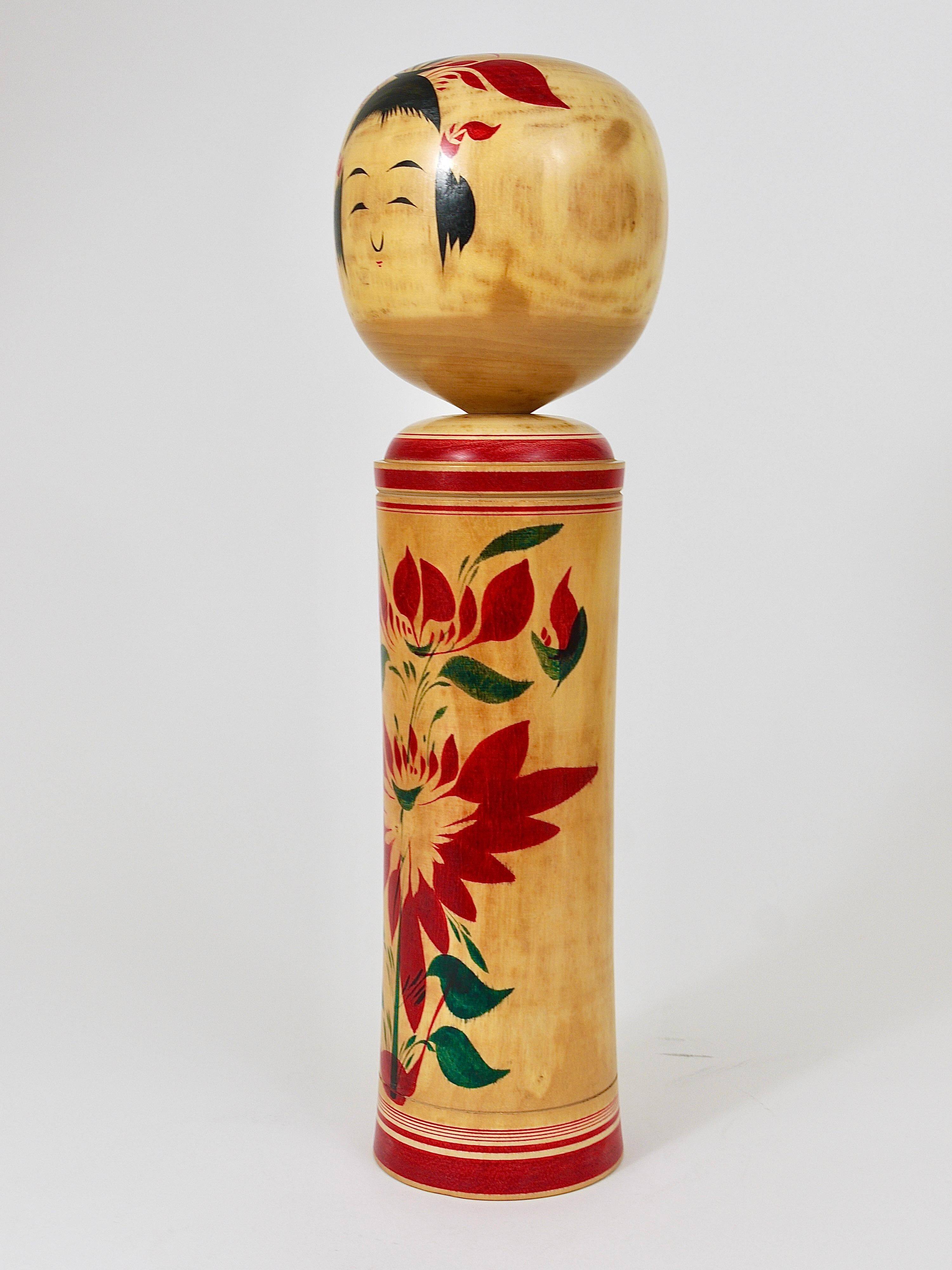 Decorative Naruko Kokeshi doll sculpture from northern Japan, hand-painted.