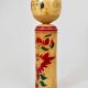 Decorative Naruko Kokeshi doll sculpture from northern Japan, hand-painted.