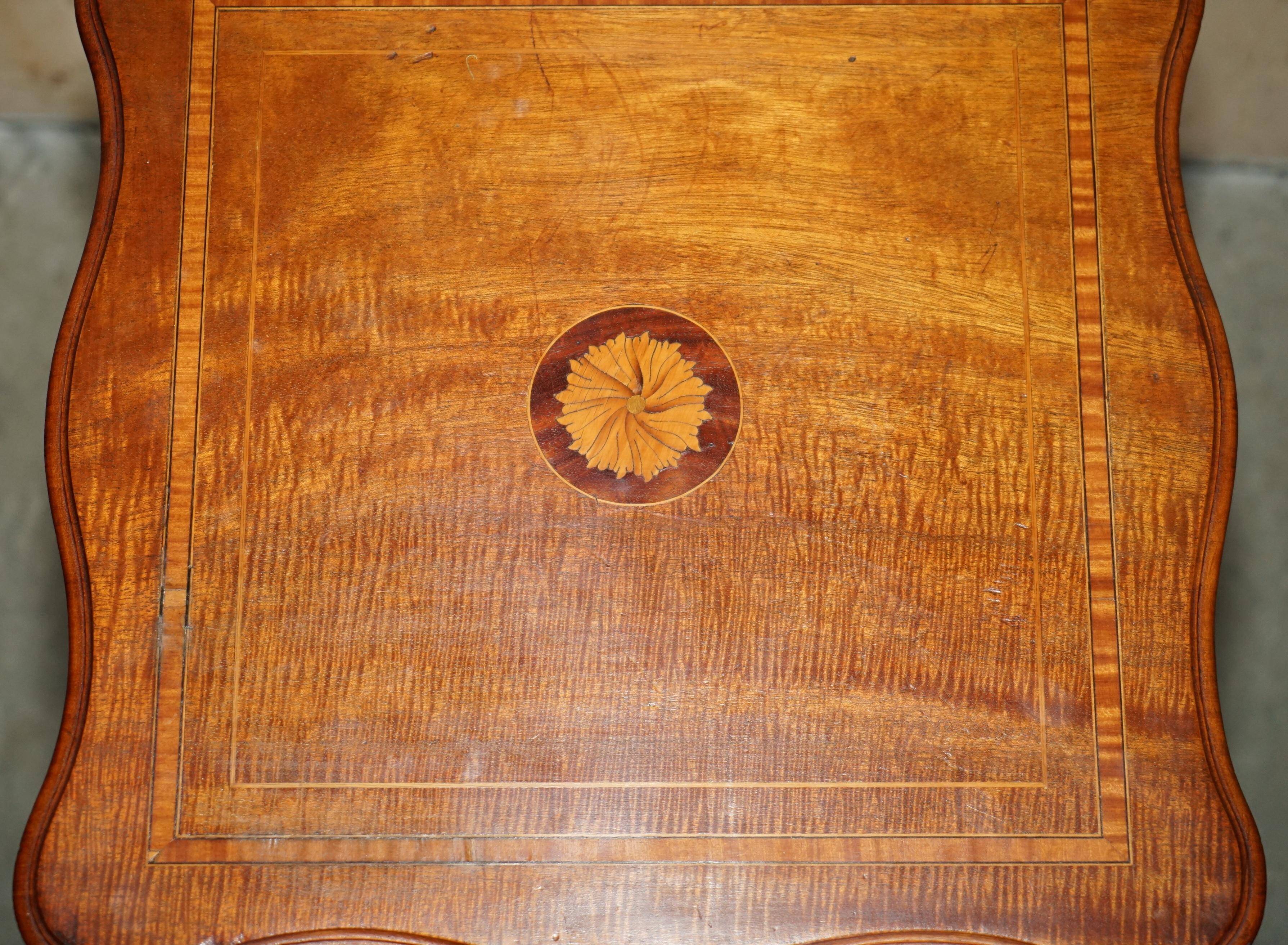 Sheraton-style rotating library table in walnut and satinwood.