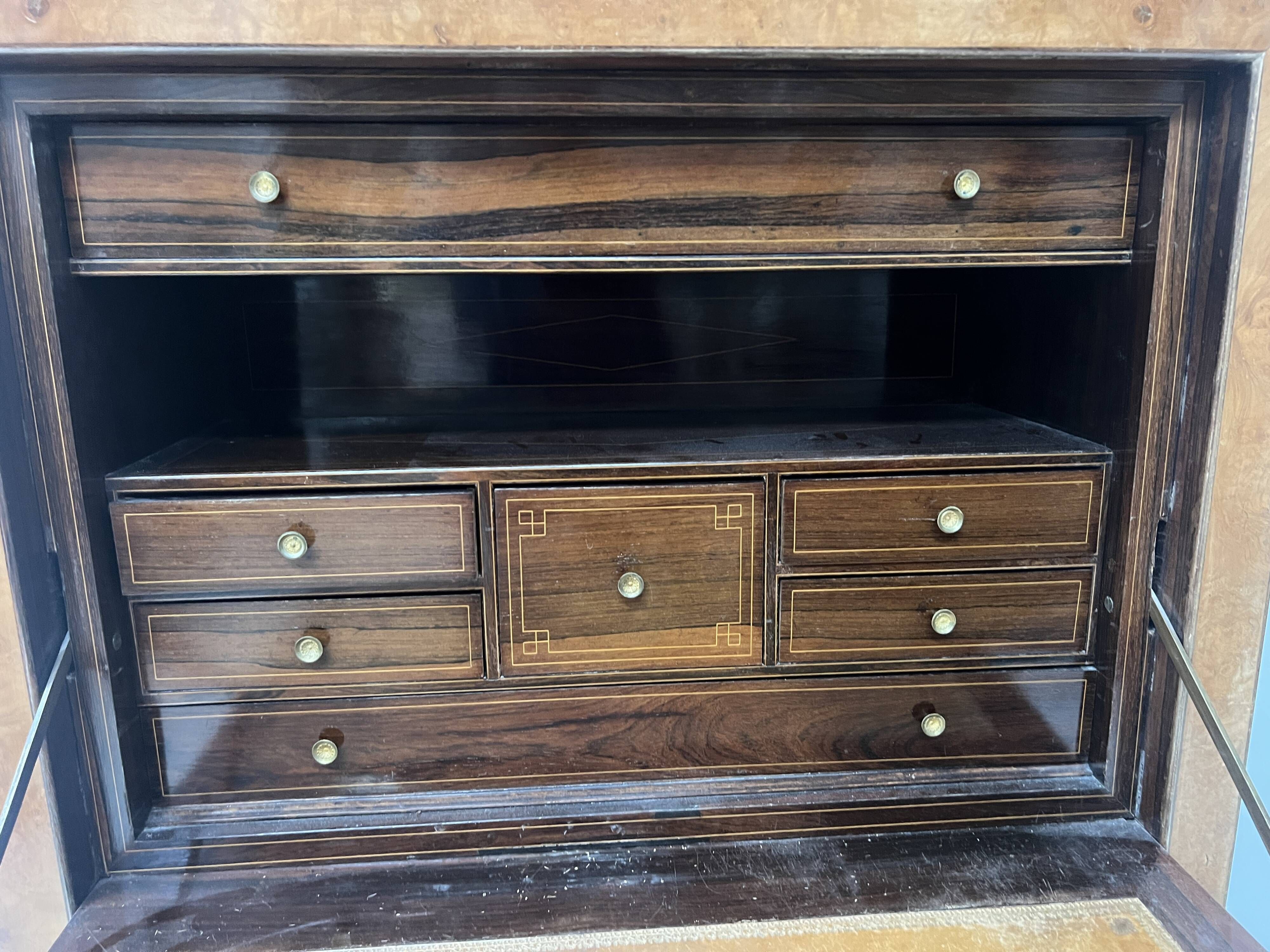 Louis Philippe secretary in light walnut briar, 19th century.