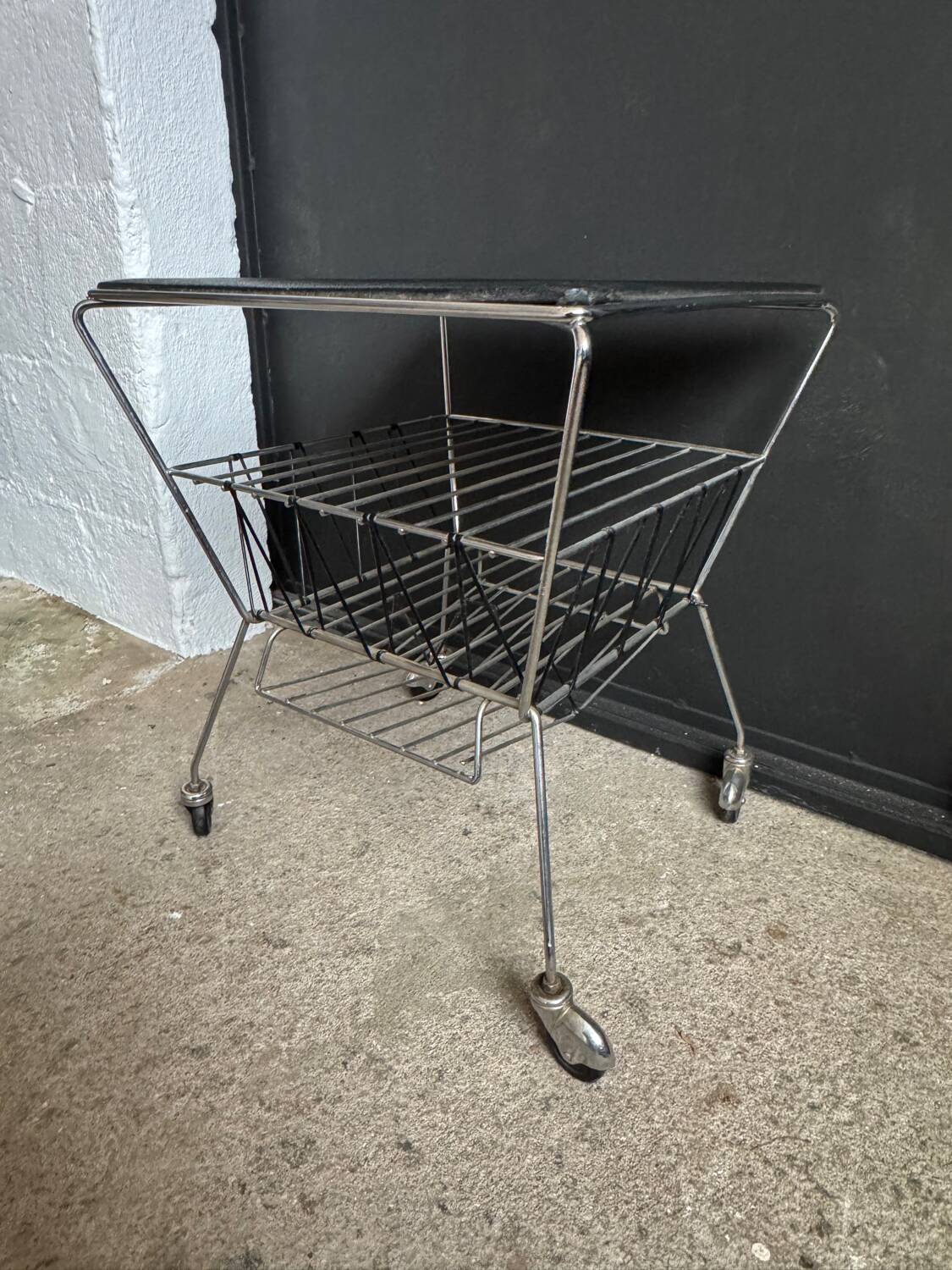 1950s rolling magazine rack