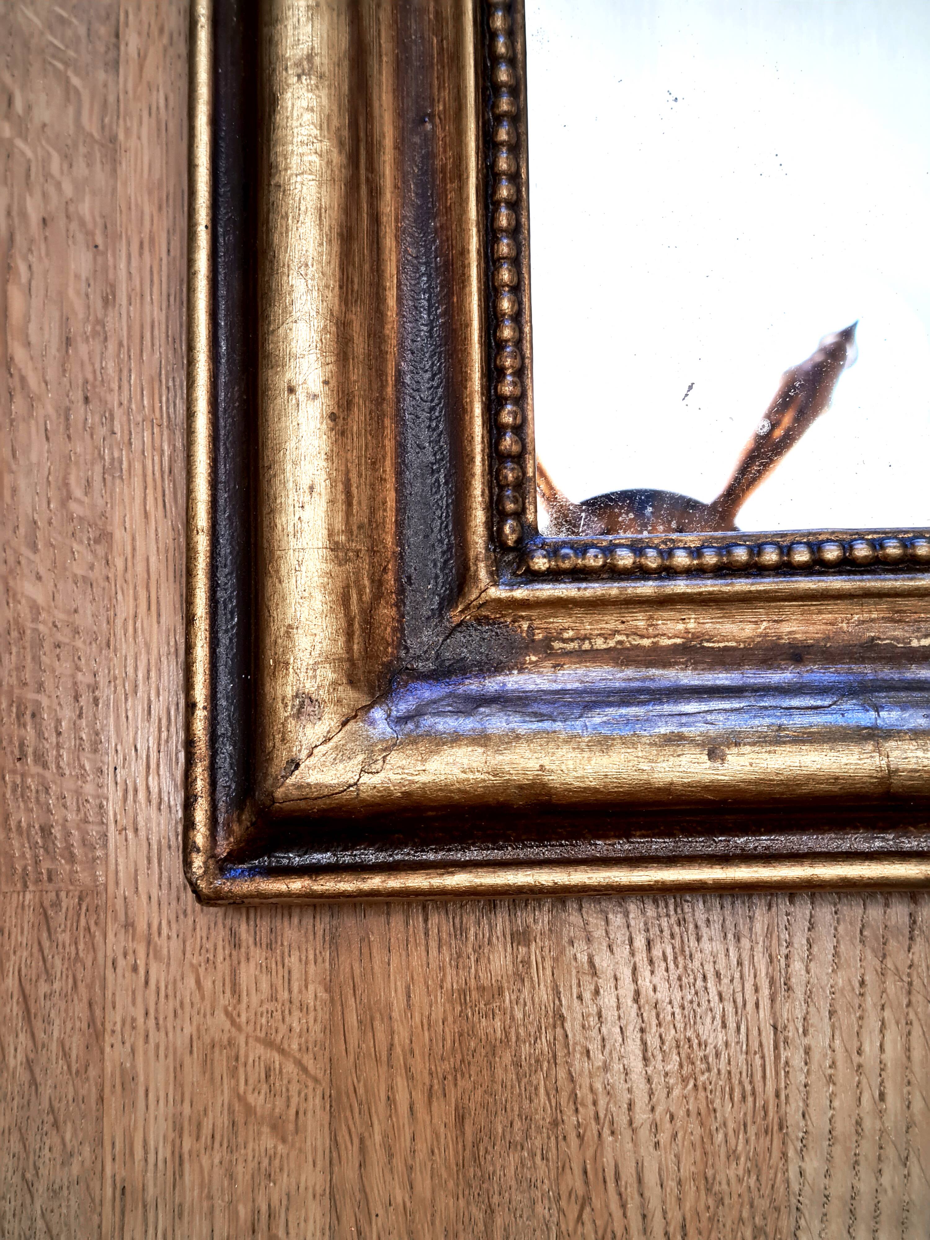 Antique Louis-Philippe gilded mirror “Apoline”