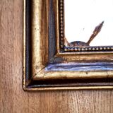 Antique Louis-Philippe gilded mirror “Apoline”