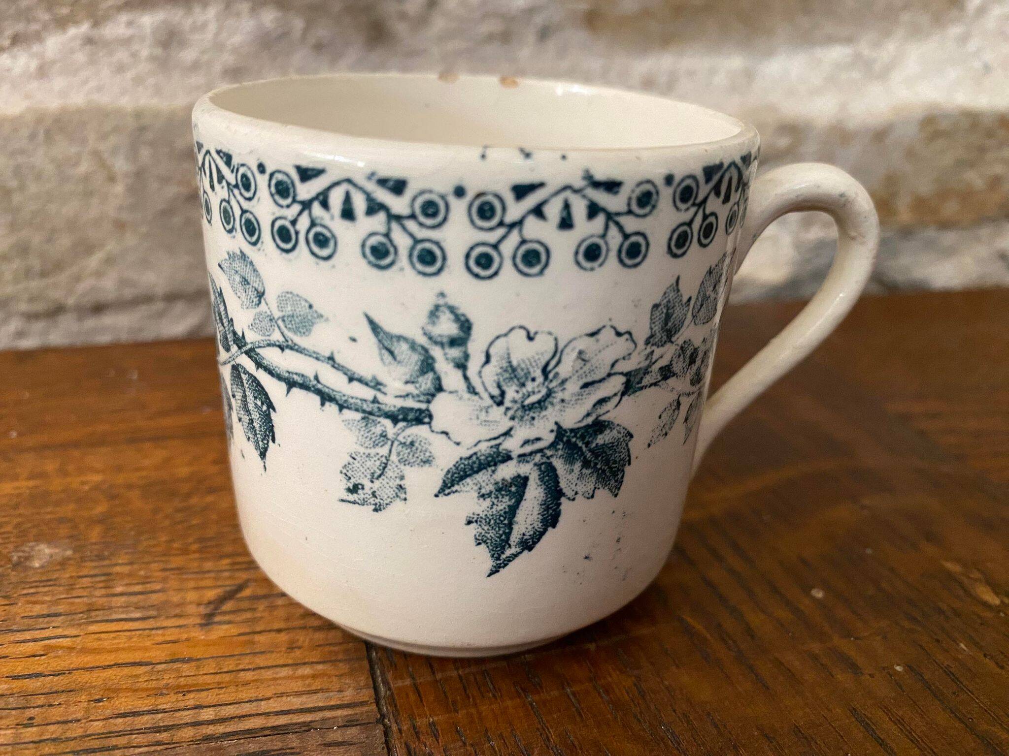 Cup and saucer old Iron earth stamped H.B.C.M Guadeloupe decoration flowers blue-green