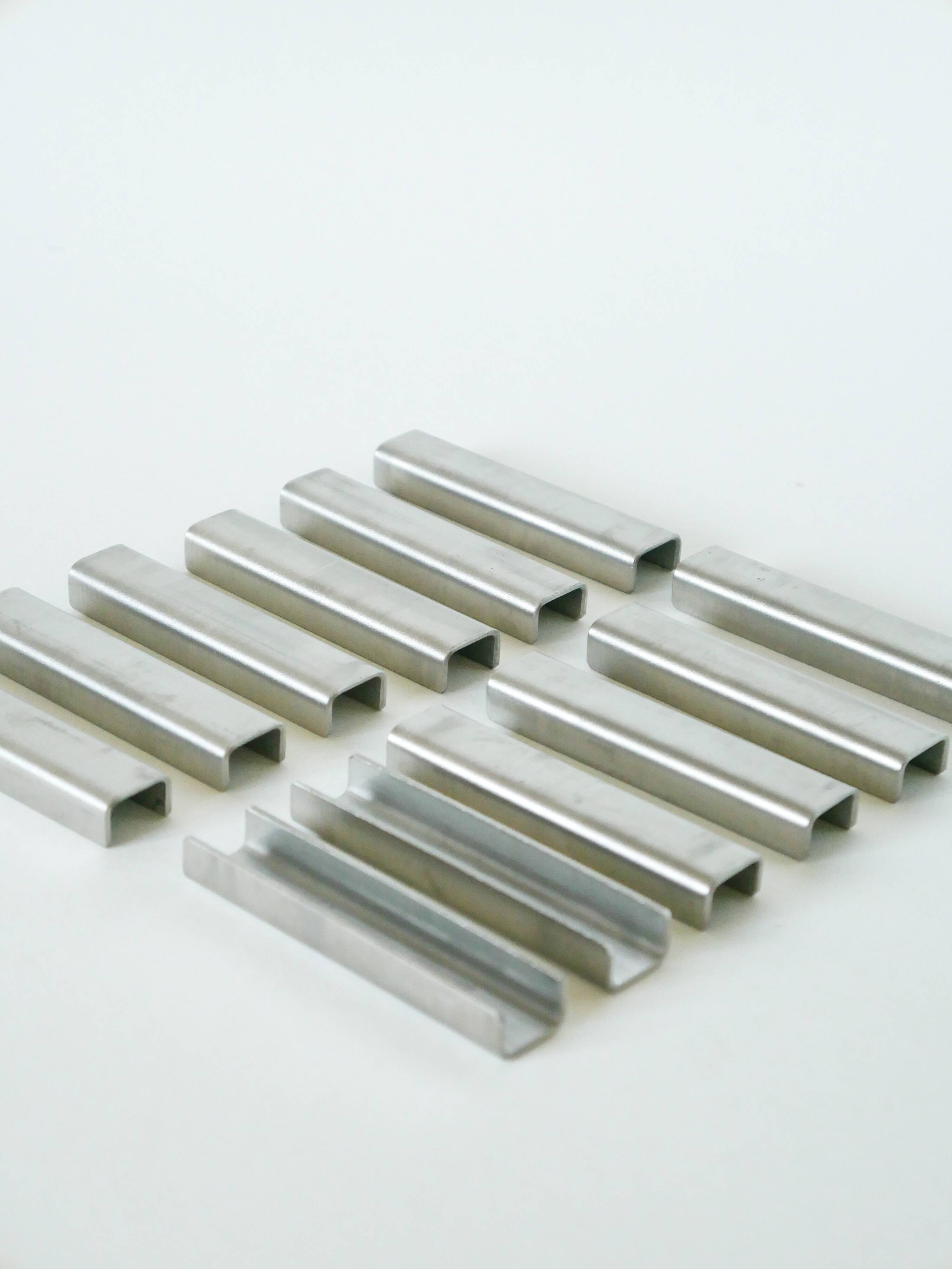 Set of 12 brushed aluminum knife holders, Design, 1970