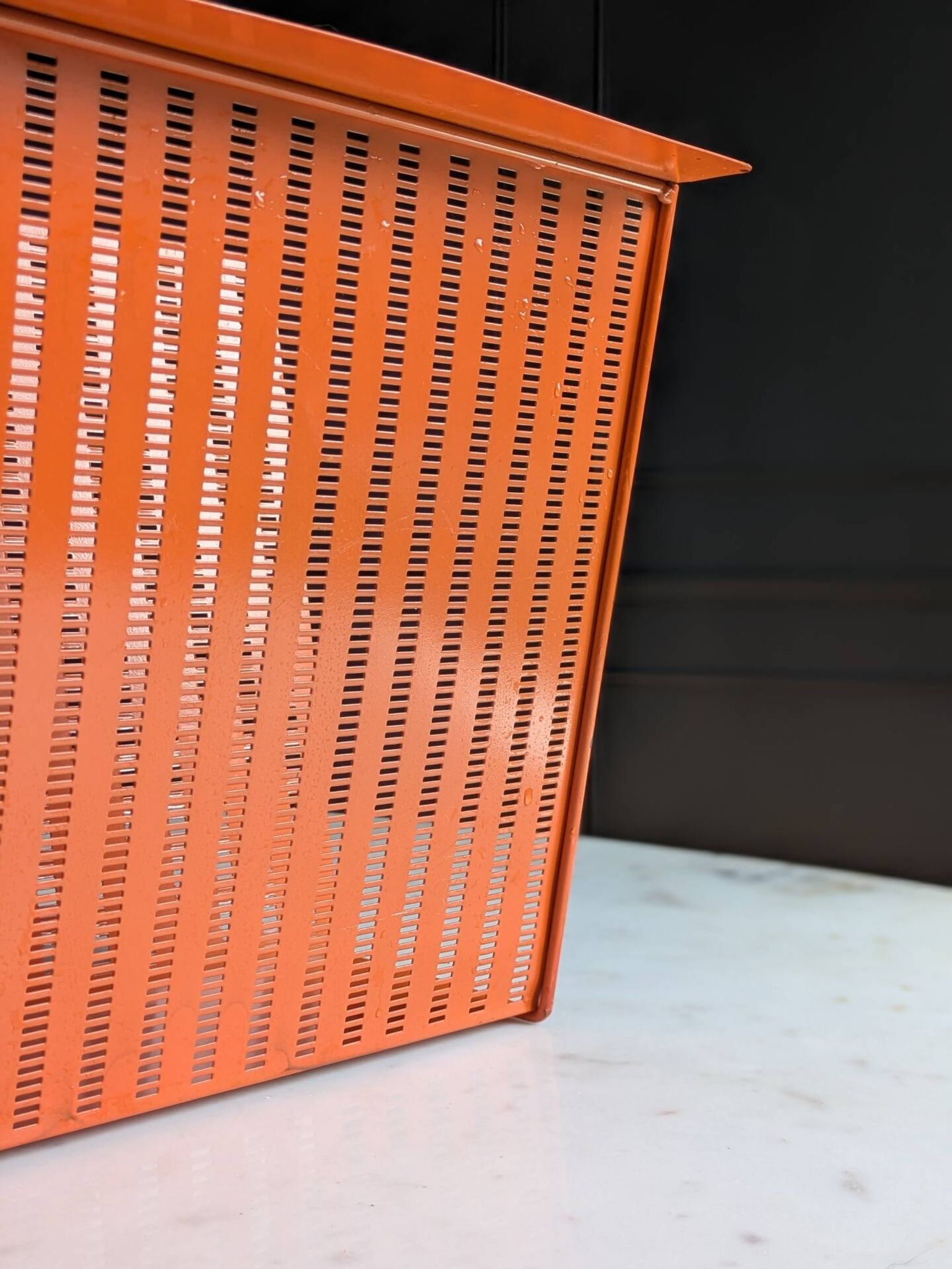 Vintage metal magazine rack in perforated orange/Mathieu Mategot style/70s