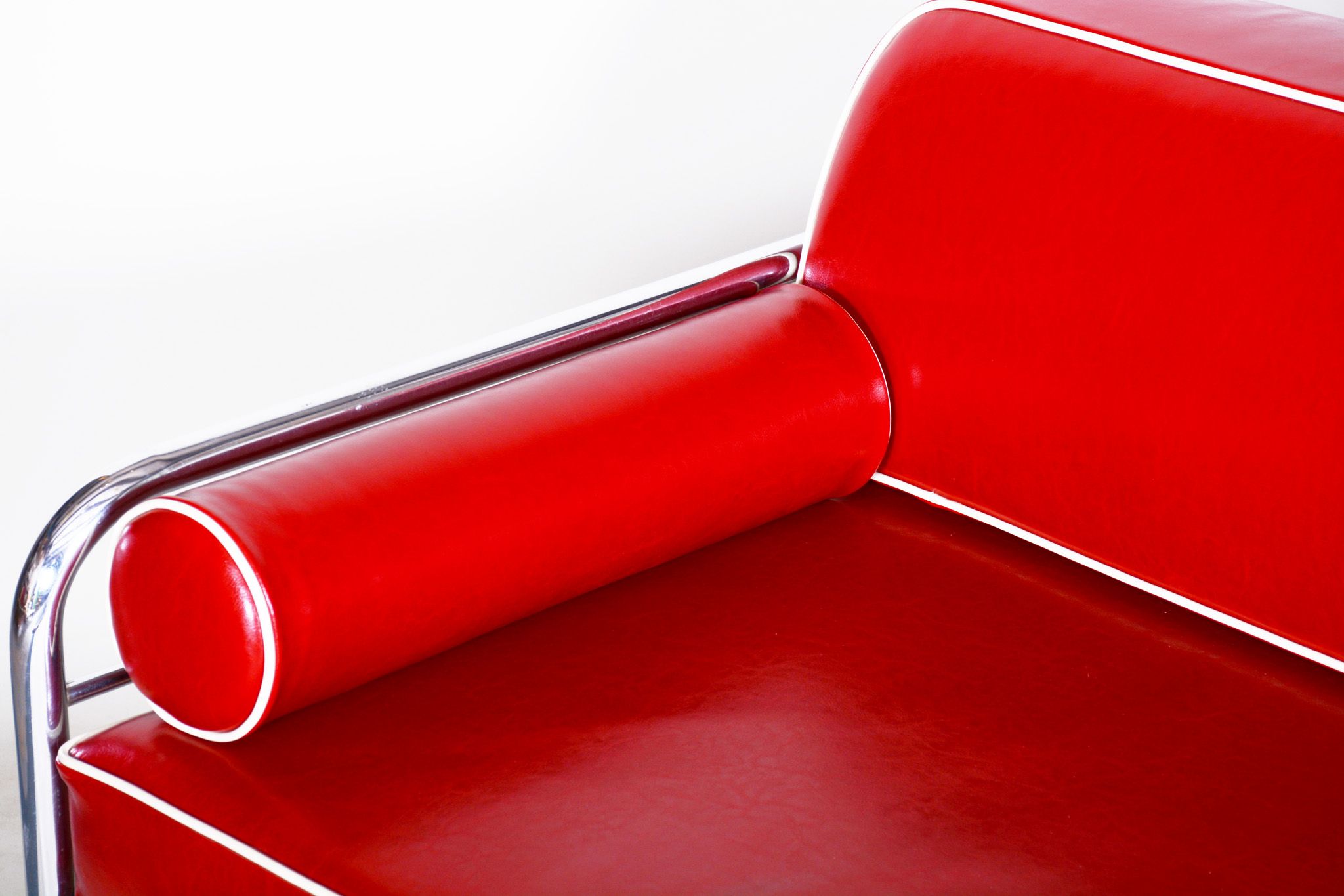 Red leather sofa by Hynekk Gottwald 1930