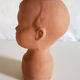 Terracotta pot cover baby head