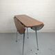Foldable brown formica table compass legs