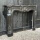 Louis XV style fireplace in black Belgian marble, circa 1880.