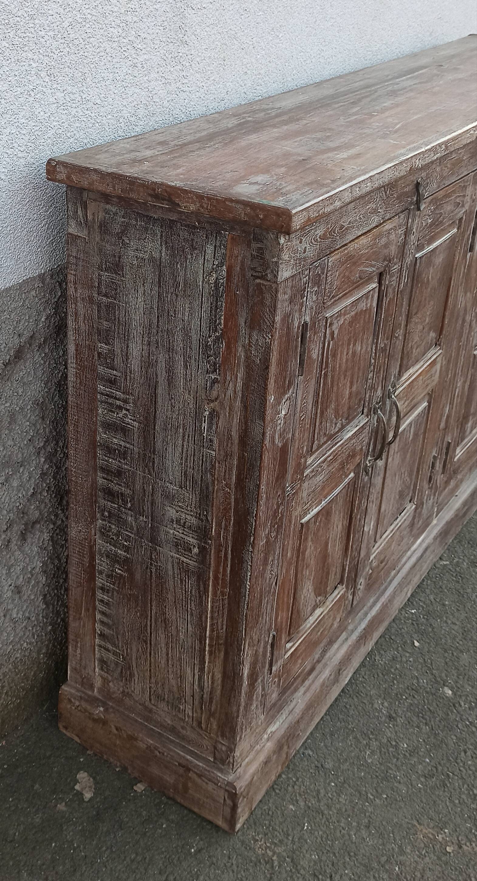 Old wooden sideboard with 4 doors