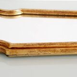 Miroir en bois doré à la feuille d'or