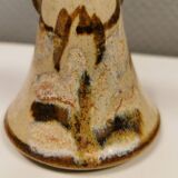 Ceramic candle holder, in the shape of an angel, signed at the bottom.