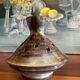 Stoneware flower vase sign