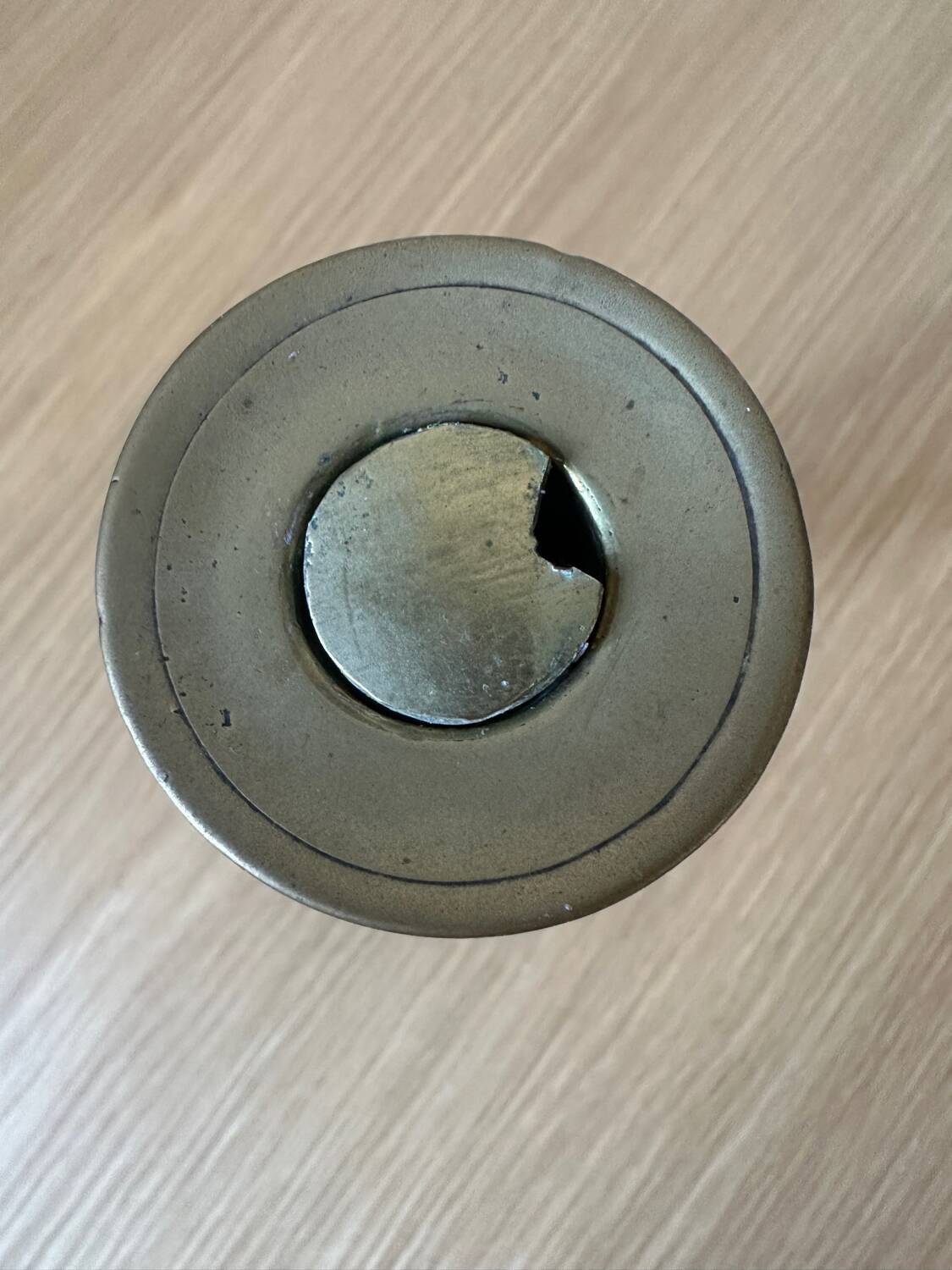 Old brass pull candle holder