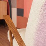 Vintage beige bouclé armchair with walnut wood from the 1950s.