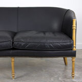 Black leather club sofa