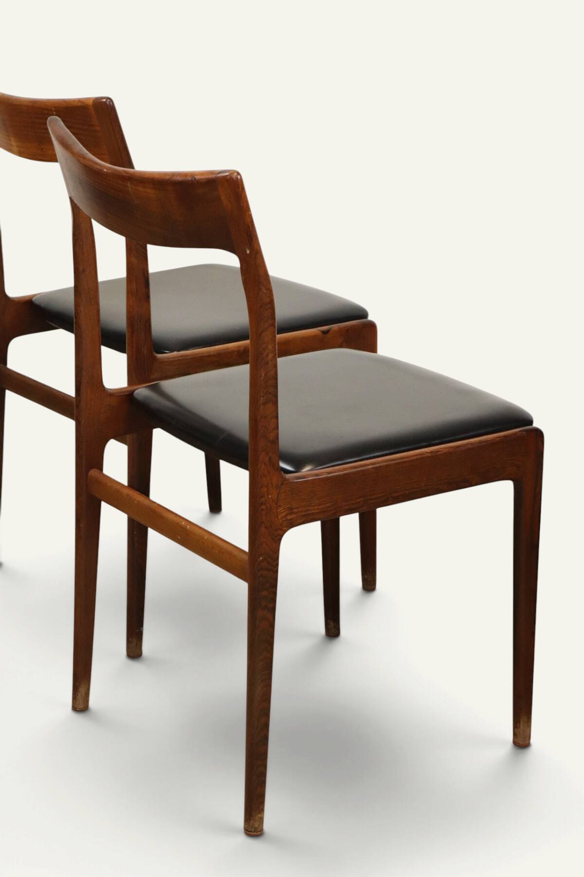 Set of 4 vintage teak and black faux leather chairs – 1960s