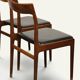 Set of 4 vintage teak and black faux leather chairs – 1960s